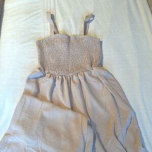 Blush pink, beach walker romper. Wide leg and stretch top.